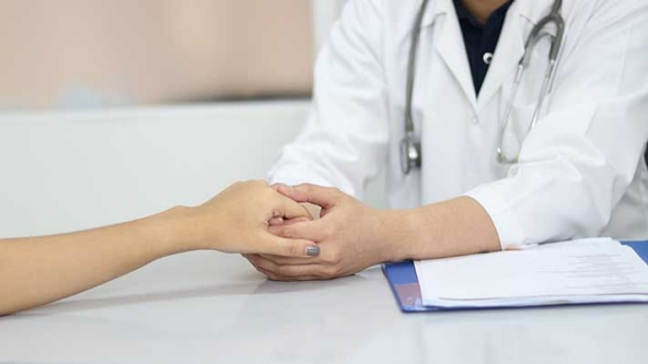 article-image-doctor-holding-patient-hand